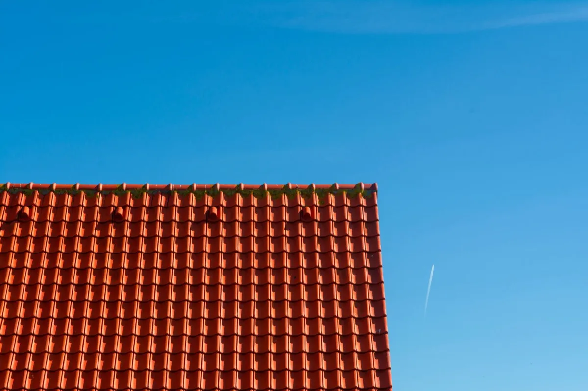Tile roof gable in full sun, the kind of exposure that sets roof life in Fernley, NV